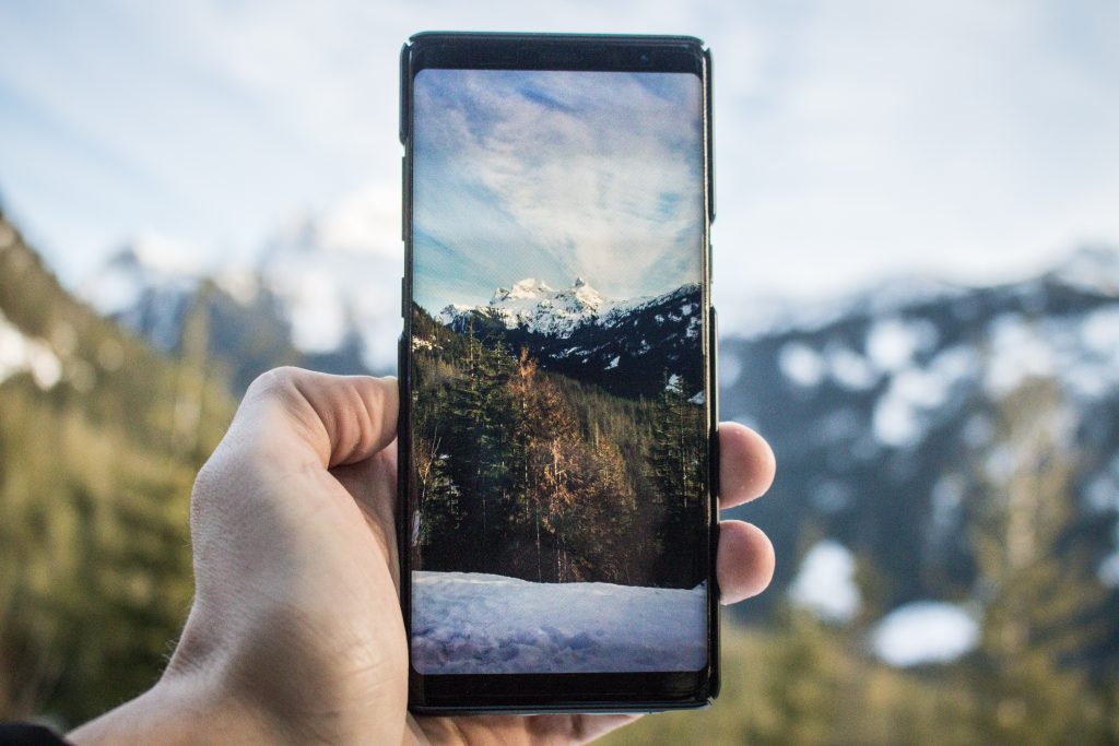 Beautiful mountains surrounded by snow from inside the phone