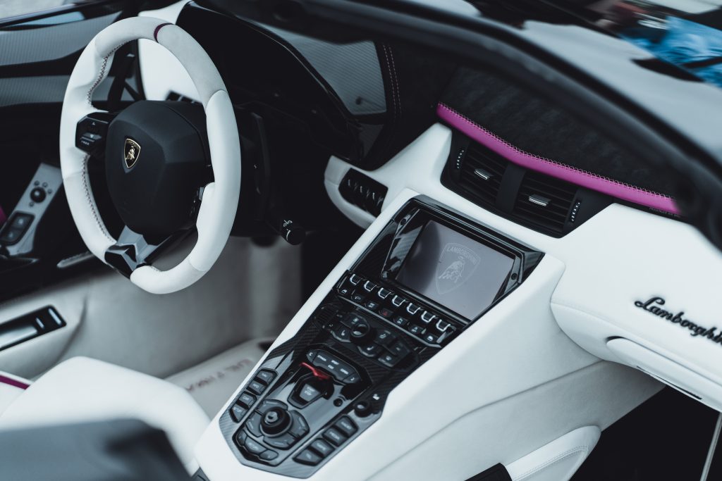 Lamborghini car interior details, steering wheel, dashboard and dashboard close-up