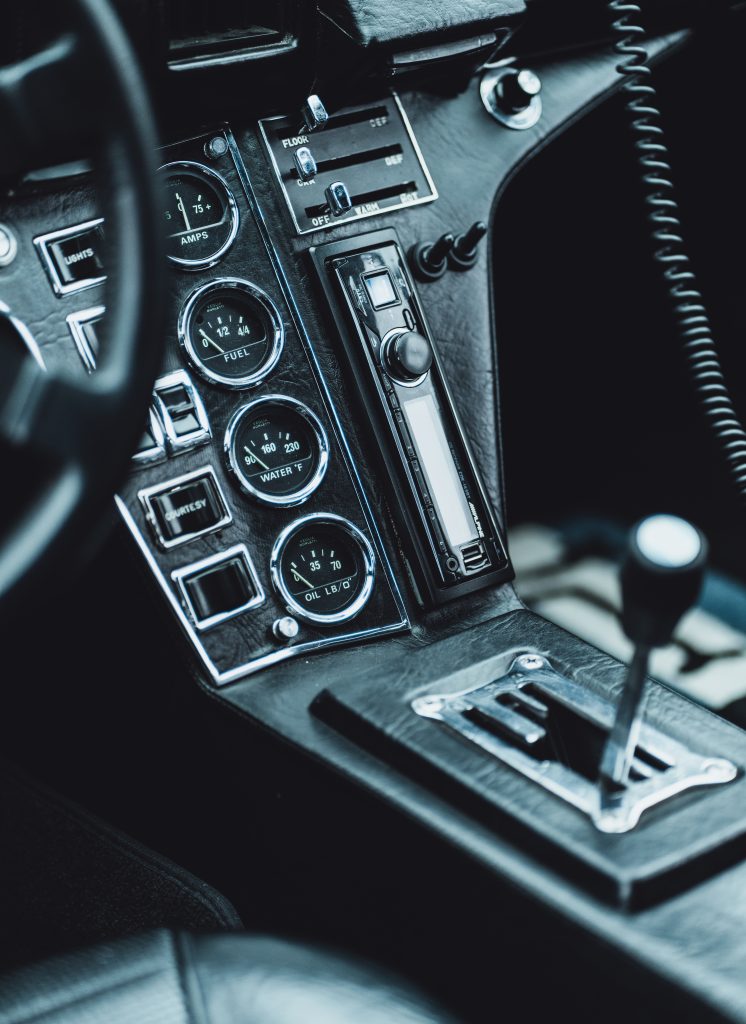 Interior of a Vintage Car. Steering wheel and dashboard. Black and white