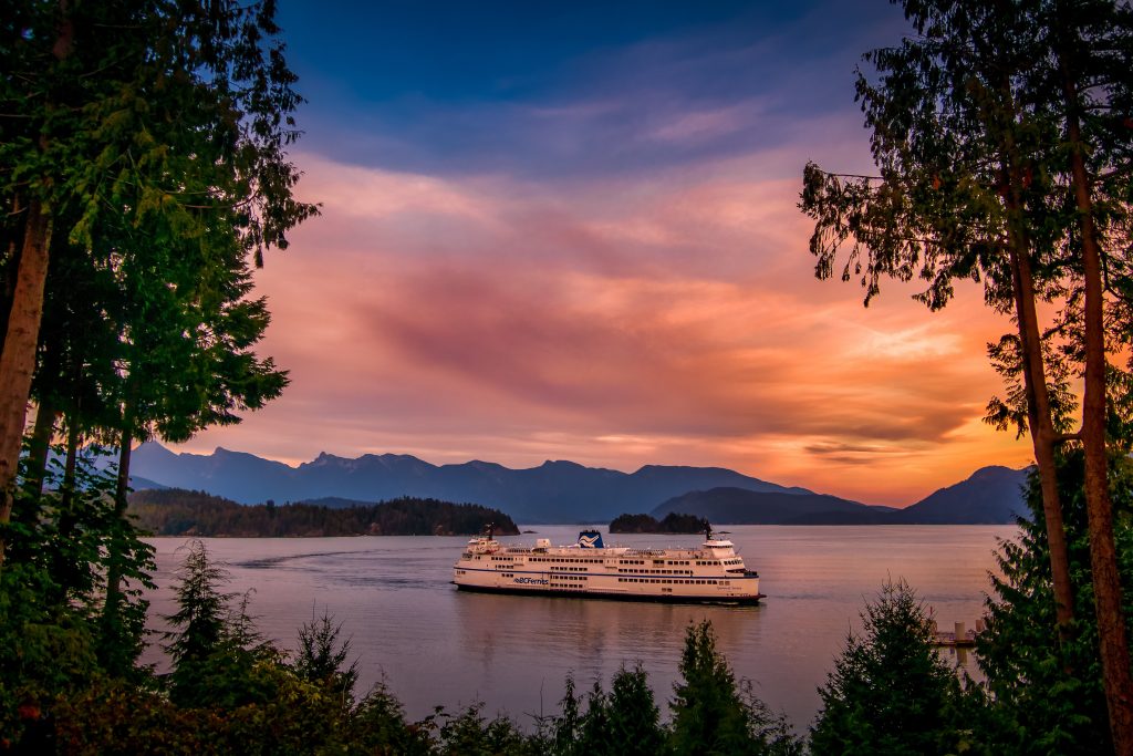 Ferry boat cruising during sunset