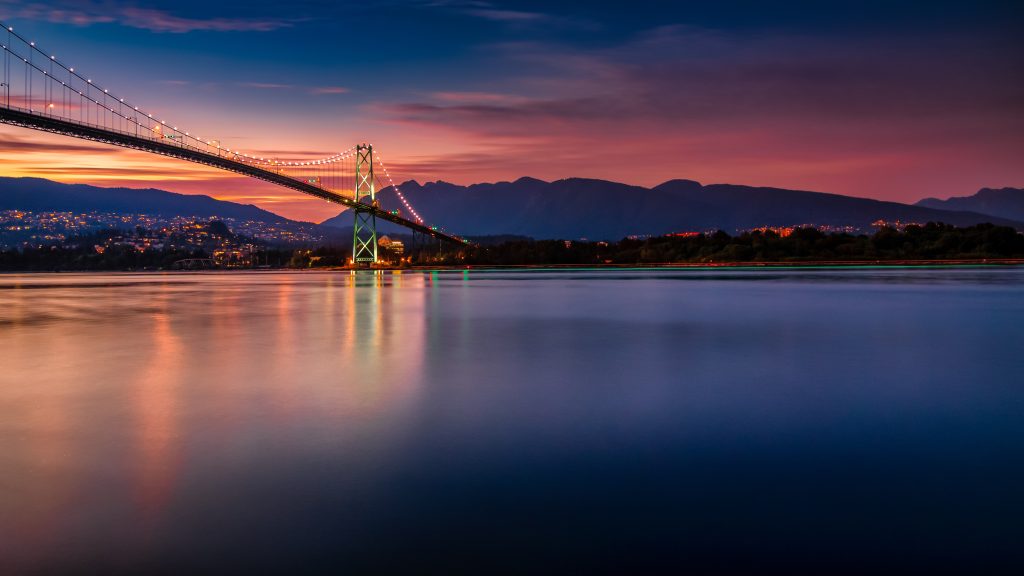 Lions gate bridge over burrard inlet at sunset