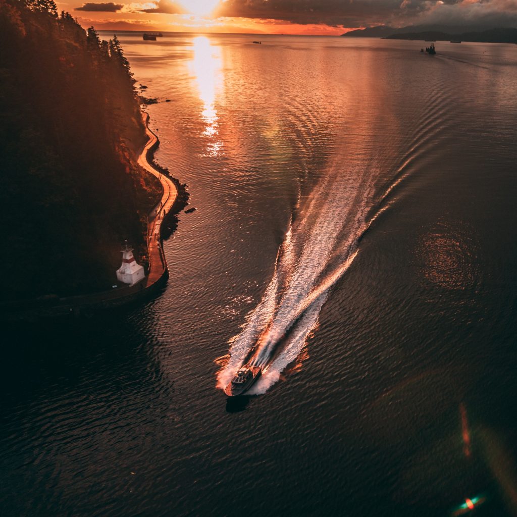 White cruise ship in body of water