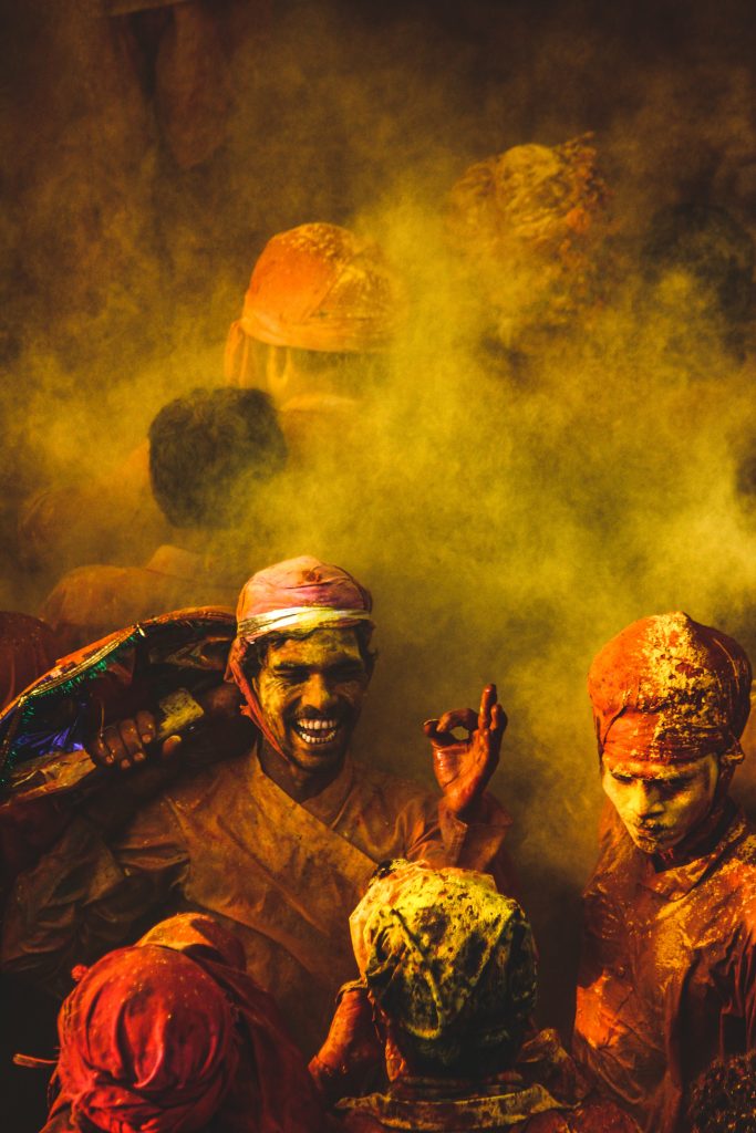 Indian Holi Color Festival: People Covered in Vibrant Powder Celebrations